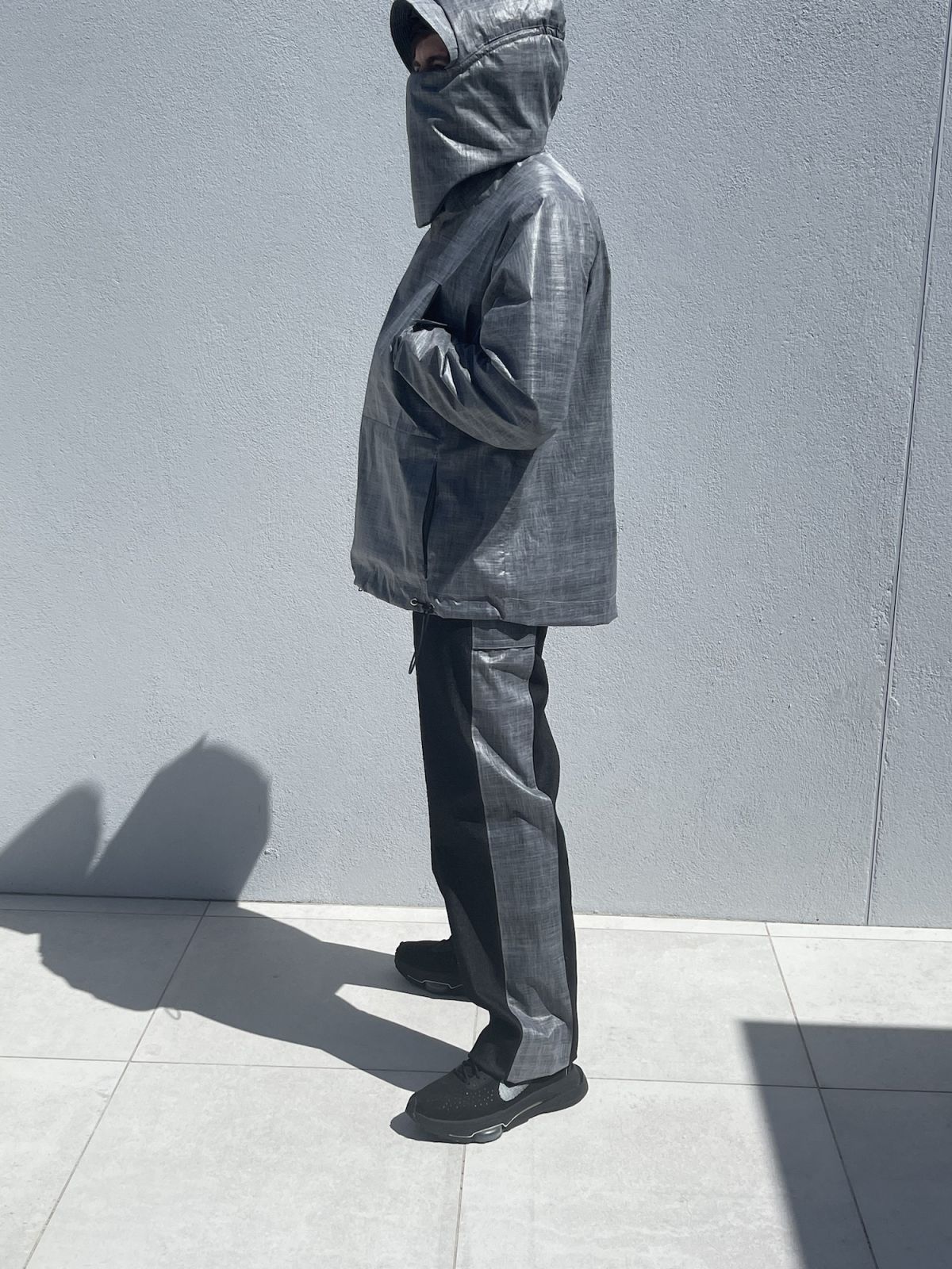 Waterproof jacket and side panelled jeans