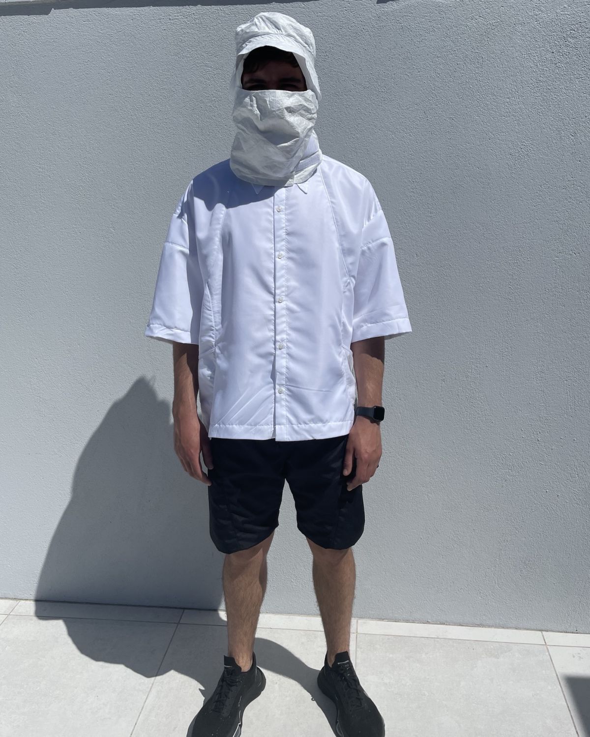Polyester shirt with curved panels and lightweight polyester shorts