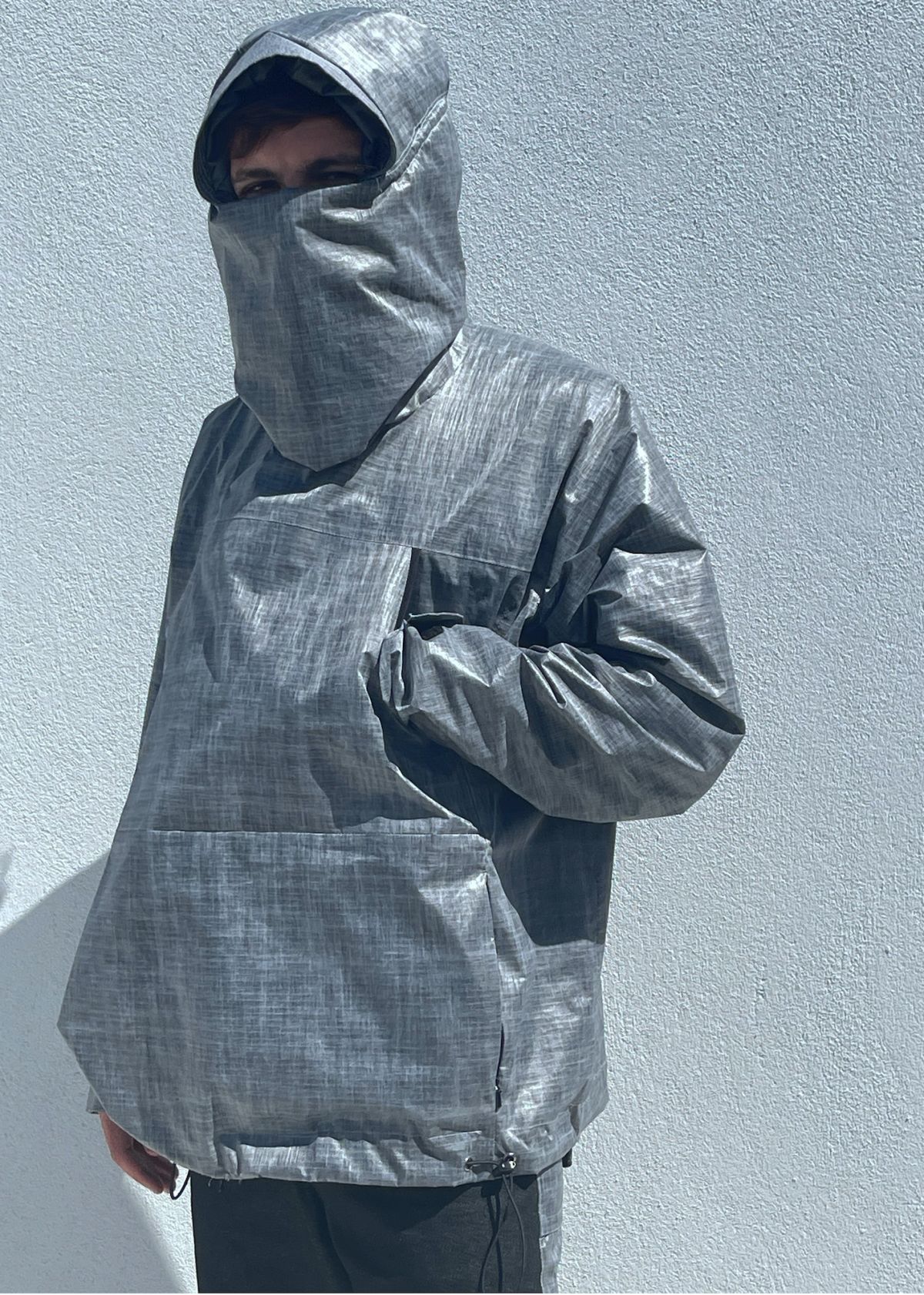 Waterproof ripstop and polyester taffeta jacket with detachable hood accessory