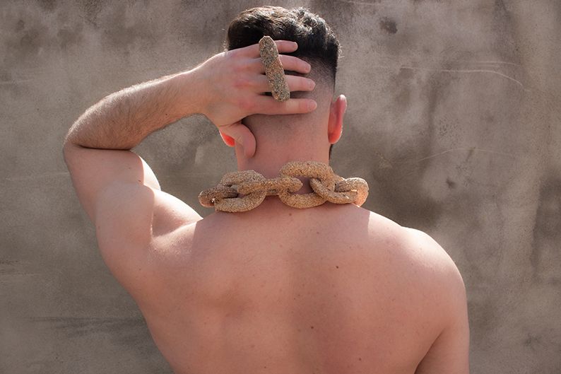 Back of Rustic Necklace and a Two Finger Ring