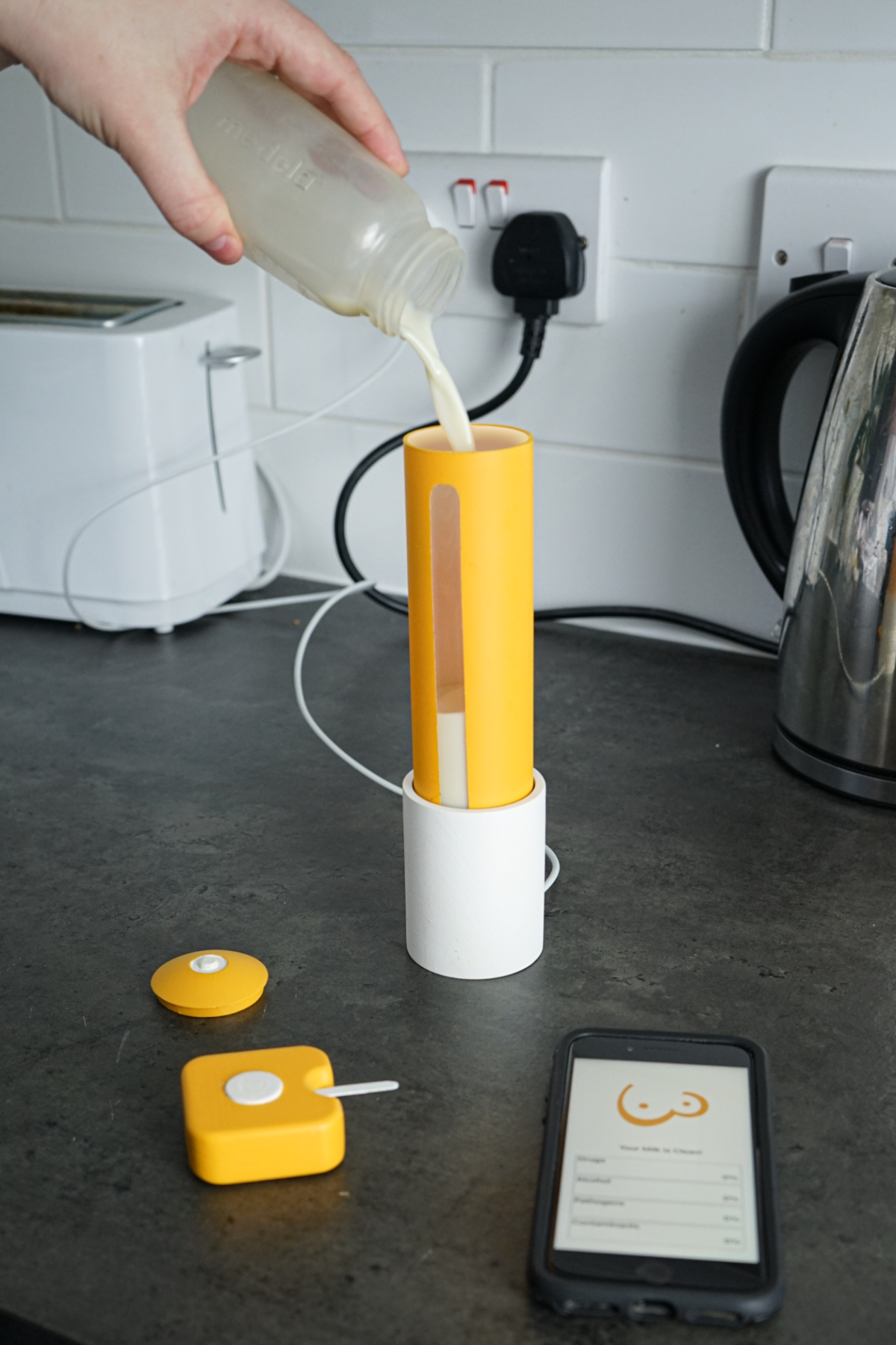 Pouring milk into the pasteuriser