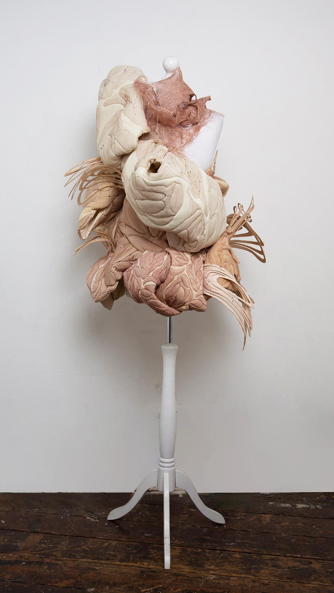 Textile sculpture displayed on the mannequin