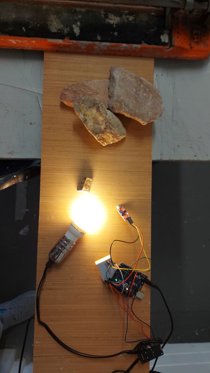 Image from testing out sound and light feature for the hanging sound sensitive sculpture with rocks