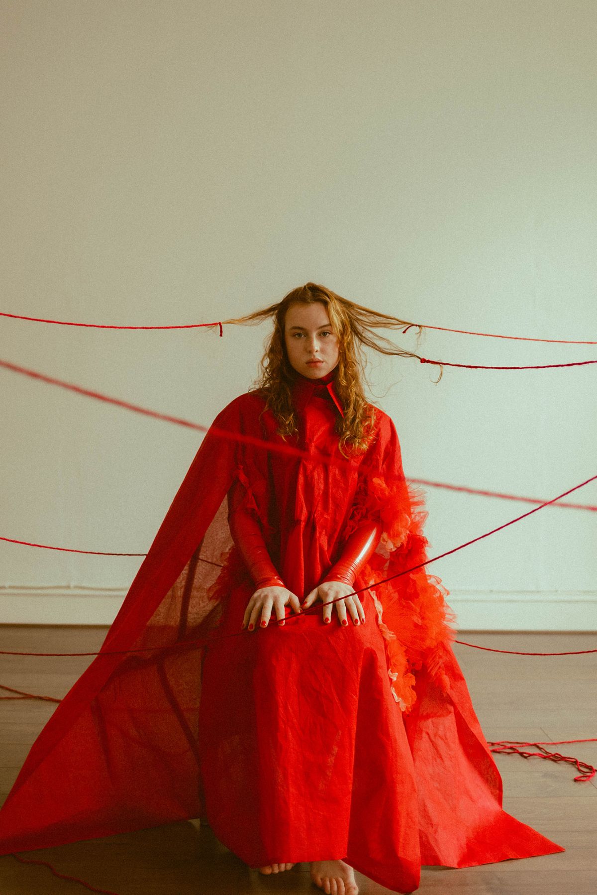OUTFIT 1: Cotton organdy gathered chest cape paired with detachable collar and fitted latex long-sleeve top and leggings