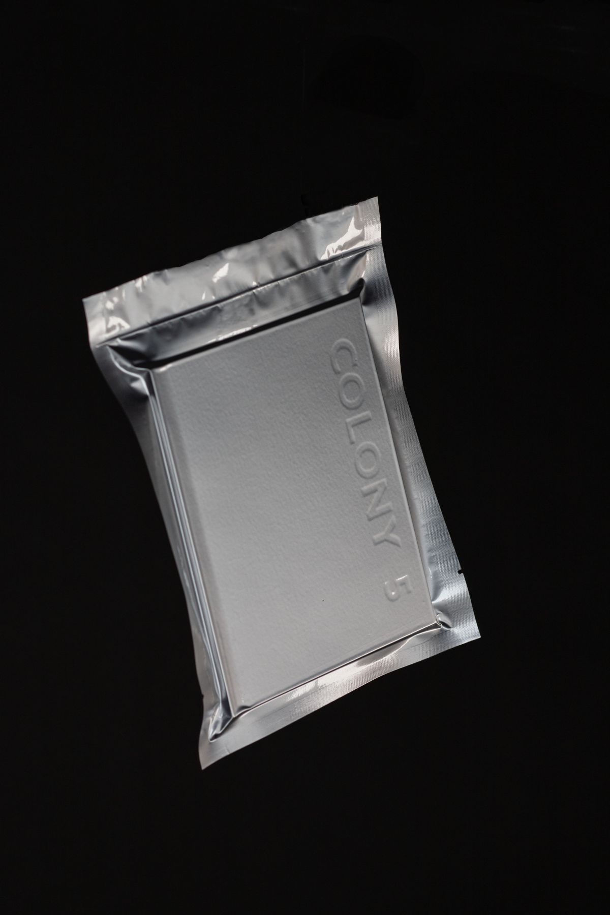 When it came to deciding on the cover and possible packaging, I decided to vacuum pack the book, like they do with space food for astronauts. Keeping it air tight would also make sense for preserving archival imagery