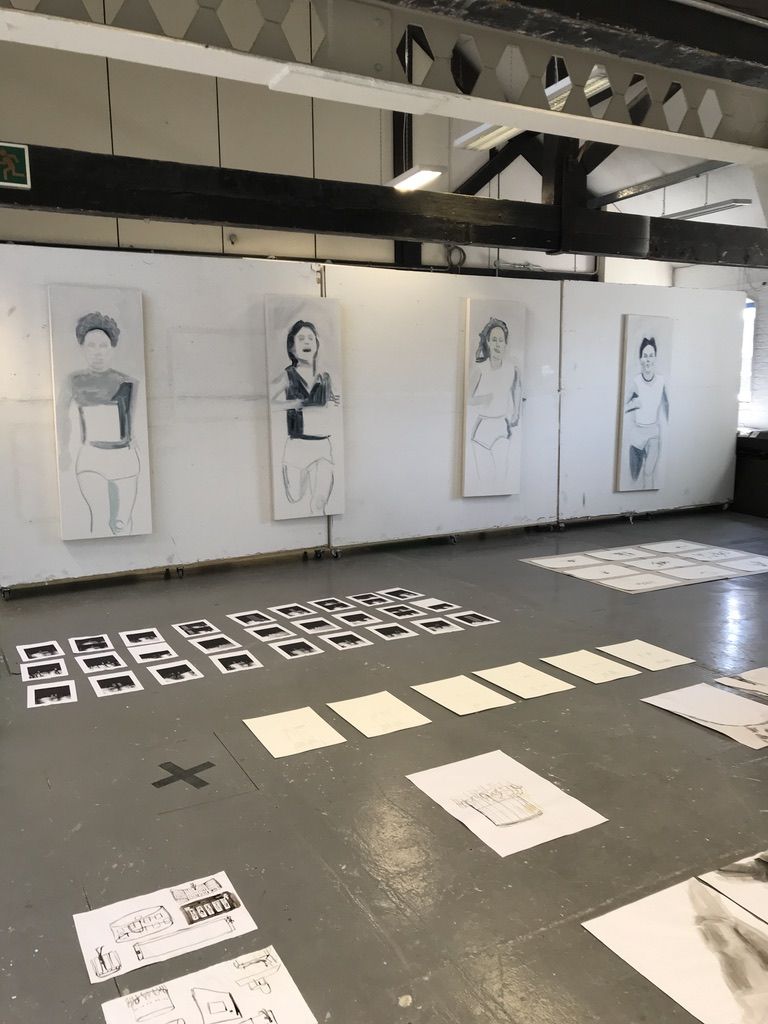 Installation of Winning/Losing on partitions and series of works positioned on floor in Margaret Clarke Gallery