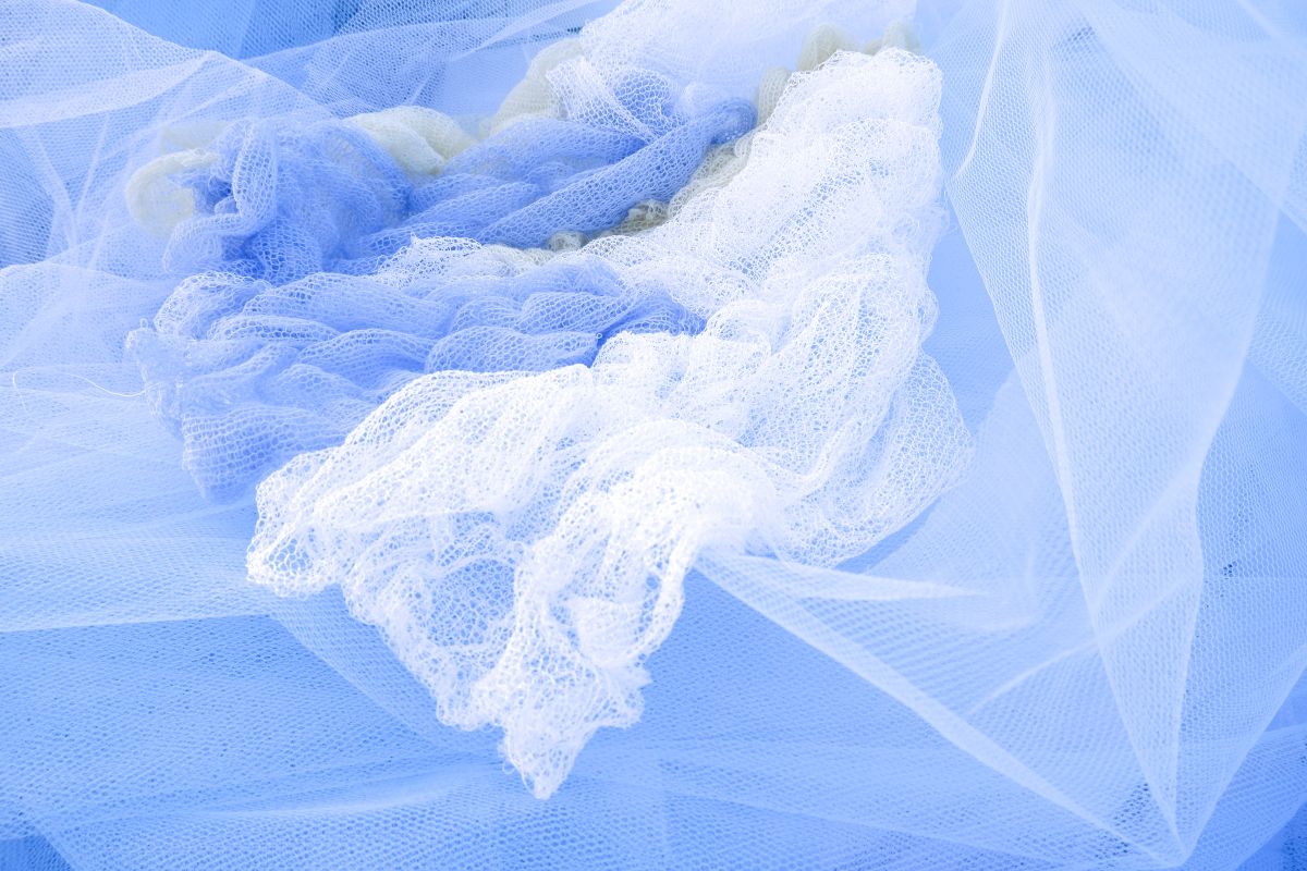 Cumulus Cloud Association. Individual machine knit pieces combined together for volume and fabric folds