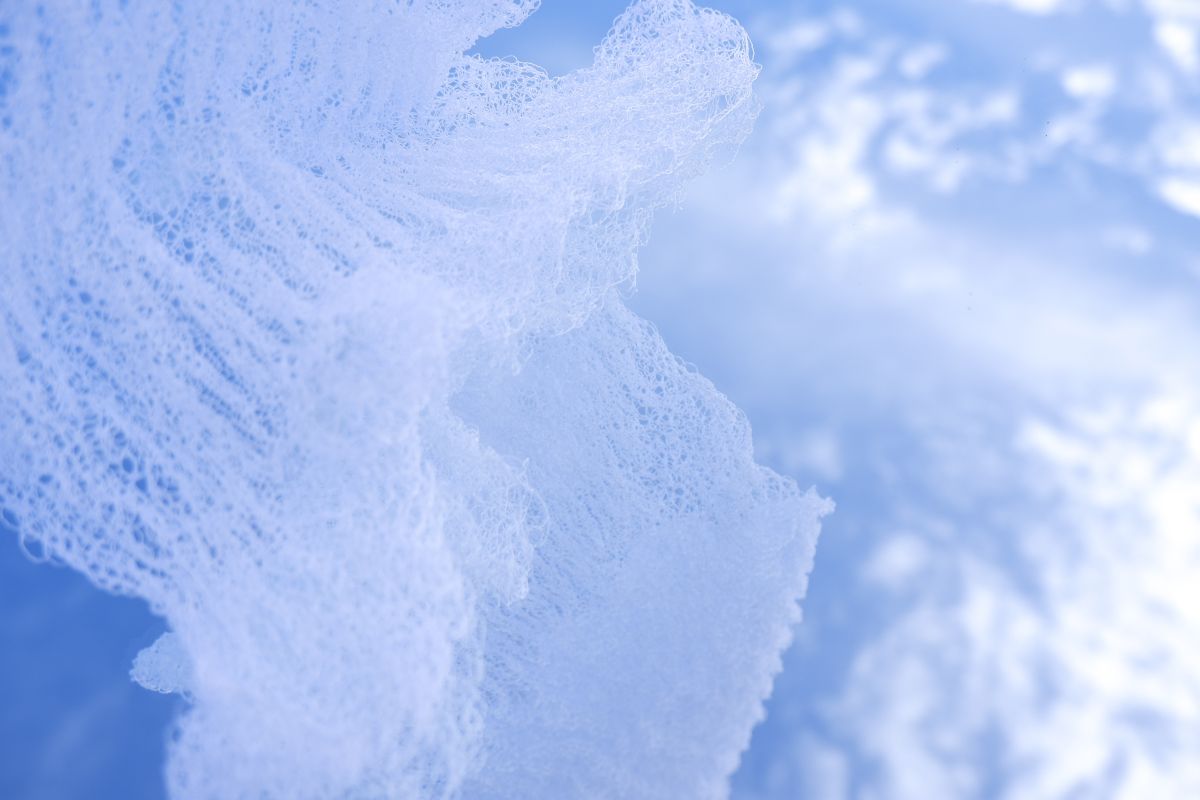 Strato Cloud Association. Knit on a passap double bed machine, racking the back bed to create a subtle wavy detail